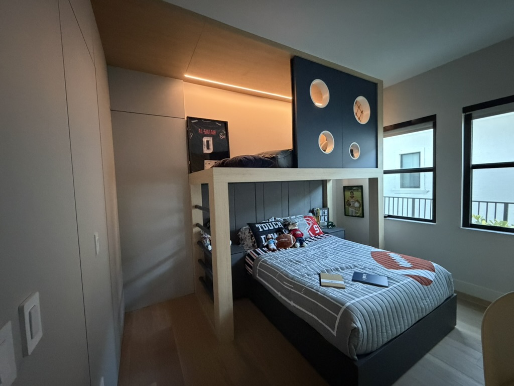 Custom loft bed with integrated lighting